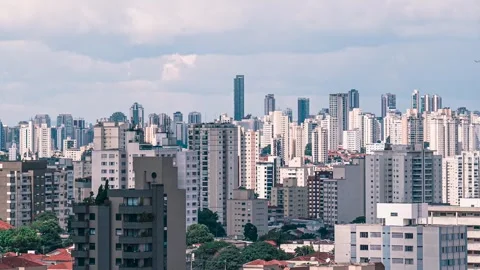 Timelapse Of Storm Clouds Shadows Over São Paulo City Skyline, Brazil Vídeo Stock 255382016