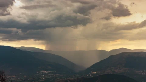 Timelapse of a storm coming into the valley Stock Footage