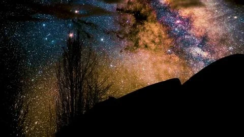 Timelapse Storm over Monument Valley rock reveals. Star Trails Galaxy Spins Stock Illustration