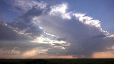 Timelapse stormy clouds motion in summer day rainfall on agriculture cereal land Stock Footage 81986983