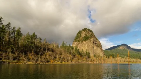 Timelapse of stormy clouds over Beacon Rock along Columbia River Gorge UHD Stock Footage 84809378