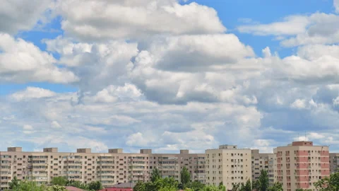 Timelapse of stratocumulus clouds over Eastern Europe city buildings, during day Video stock 146240275