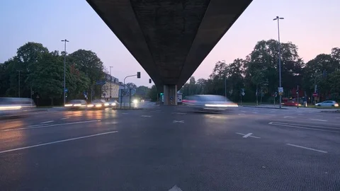 Timelapse of street crossing under a bridge and moving cars in Cologne, Germany Stock Footage 80350295