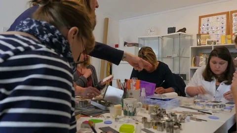 Timelapse of students learning from teacher in studio Stock Footage 76902648