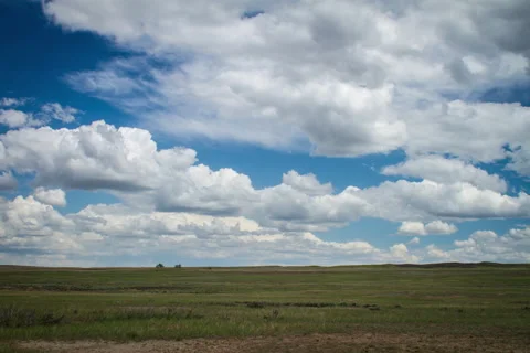 Timelapse summer clouds casting shadows over prairie dog town Stock Footage 62072634