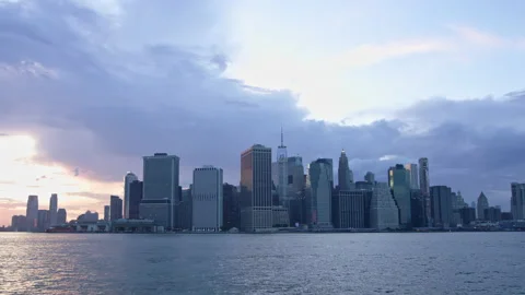Timelapse of summer clouds flying over Downtown Manhattan skyline Stock Footage 134427876