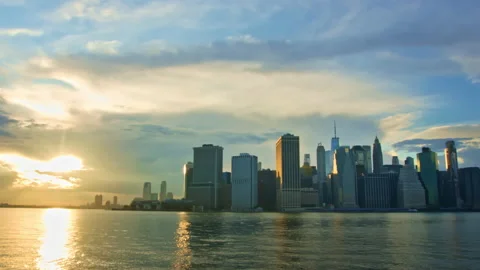 Timelapse of summer clouds flying over Downtown Manhattan skyline Stock Footage 134626406
