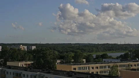 Timelapse of summer clouds forming on a suburb Stock Footage 135181371