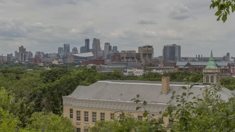 A Timelapse of Summer Clouds Passing over Minneapolis Cityscape Stock Footage 113065463