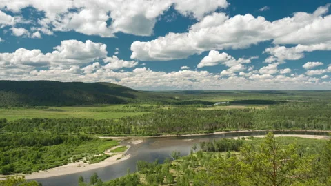 Timelapse. Summer valley landscape with river, hills, running clouds Stock Footage 132712128