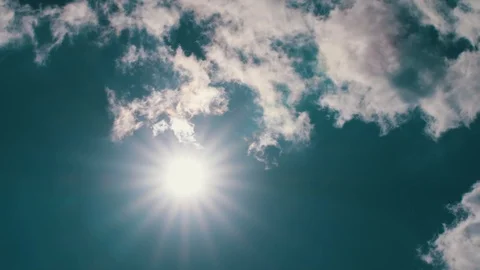 Timelapse of sun and clouds Stock Footage 128506855