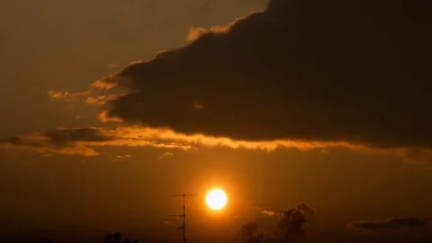 Timelapse sun and clouds at sunset Stock Footage 84456501