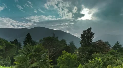 Timelapse of the sun behind clouds Stock Footage 11576054