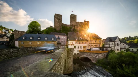 Timelapse of Sun Behind Runkel Castle and Bridge [8K] Stock Footage 143662243