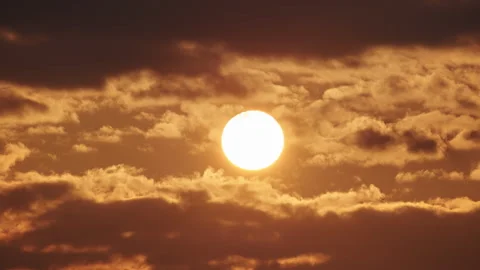 Timelapse of sun close-up rising over mountain horizon.  Stock Footage 305159496