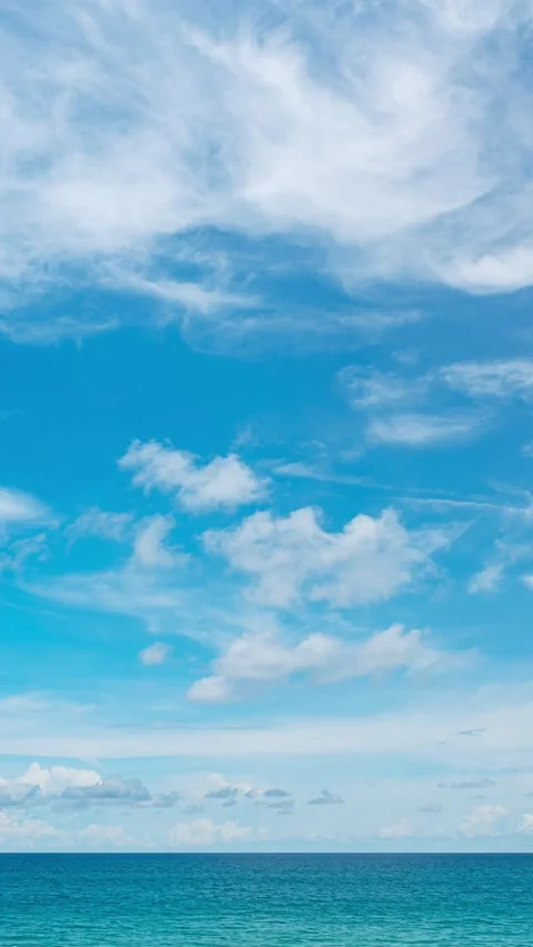Timelapse sun clouds over sea nature environment,Blue sky background in vertical Stock Footage 304563044