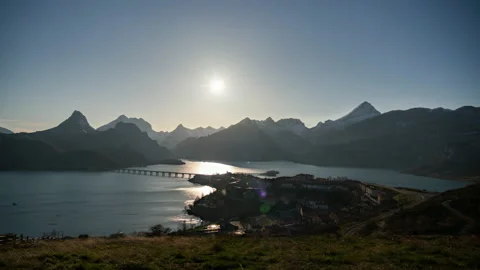Timelapse of the sun going behind the mountain at sunset in Riaño, Spain Stock Footage 177379390