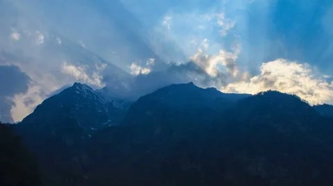 Timelapse of sun hiding behind the peaks of Himalaya Stock Footage 61786461