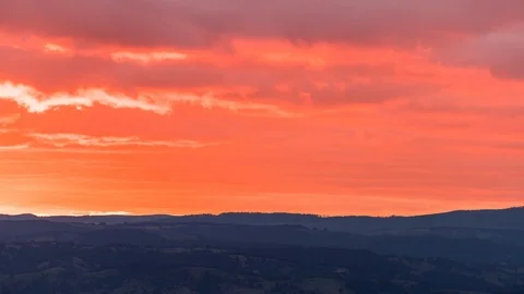 Timelapse of sun lighting up the clouds at sunset from Mount Blackheath Stock Footage 114349473
