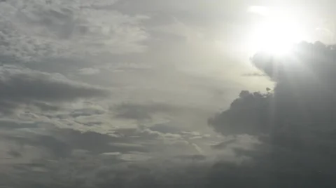 Timelapse of Sun Moving In and Out of Clouds on Steely Grey Day Stock Footage 58188827