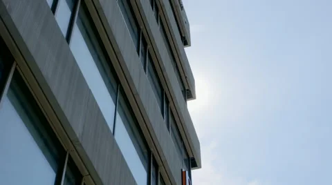 Timelapse of the sun moving from behind building Stock Footage 64554192