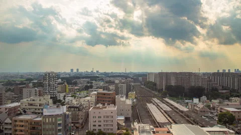 Timelapse of sun rays over Abiko Railway Station in Chiba Japan Stock Footage 341597279