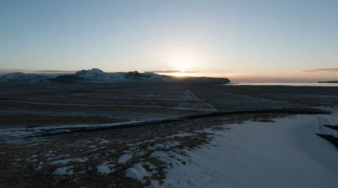 Timelapse of sun rising over snow valley, Iceland Stock Footage 36171879