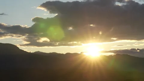Timelapse Sun Sets Through Greek Mountains Epic Sunset Powerful Heavenly Li.. Stock Footage 336515372
