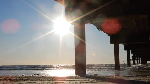 Timelapse Sun Setting By Docks Pier With Ocean Water Reflection In Ocean Stock Footage 127186170