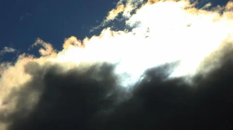 Timelapse of the sun shining through dark clouds Видео 918093