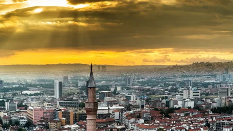 Timelapse of the sun shining through dark clouds in Ankara city, Turkey Stock-Footage 115803000