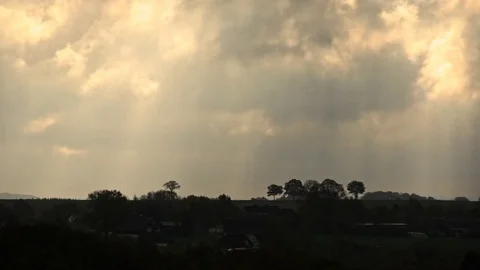 Timelapse of sunbeam under clouds on the horizion Stock Footage 81605065
