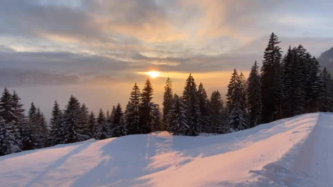 Timelapse of sundown and fog wave on snowy mountain. Stock Footage 219233612