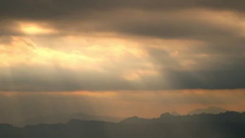 Timelapse of sunlight and clouds moving dramatically towards sunset Stock Footage 290280438