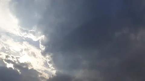 Timelapse of sunlight breaking through the clouds Stock Footage 212426474