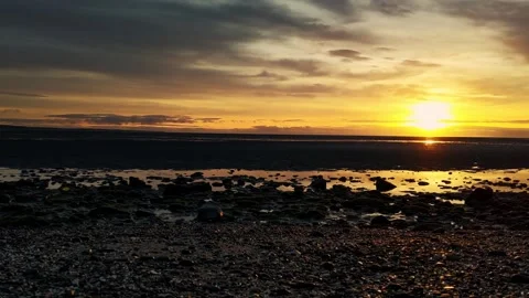 Timelapse of sunrise on a beach 스톡 동영상 164674584