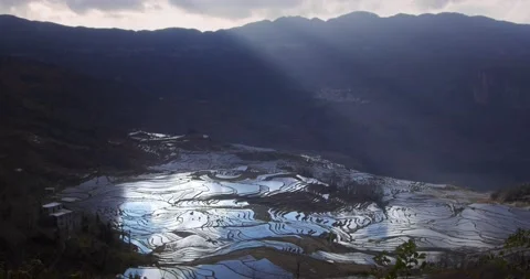 Timelapse of Sunrise Casting Light onto Yuanyang Rice Terraces Stock Footage 151356089