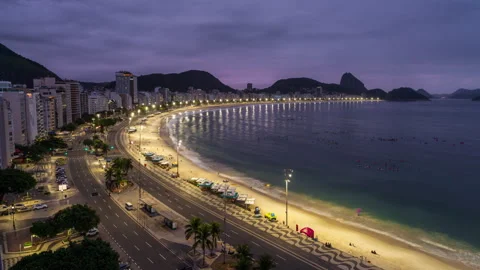 Timelapse of a sunrise at Copacabana beach 스톡 동영상 341667704