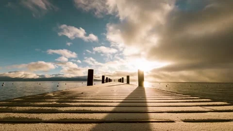 Timelapse of Sunrise from Ground Level at a Dock Stock Footage 276319637