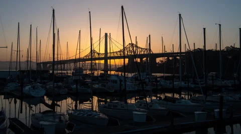 Timelapse of sunrise over boat docks on Treasure Island near San Francisco. Stock Footage 46938475