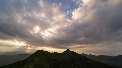 Timelapse - Sunrise over a mountain with dramatic clouds 4K60 Stock Footage 269124906