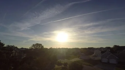Timelapse of Sunrise Over Sprawling Oceanfront Neighborhood Alongside Beach Video stock 74381787