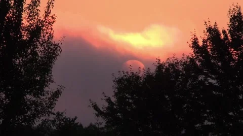 Timelapse sunrise with sunspots as clouds pass Stock Footage 51807678
