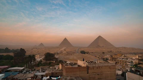 Timelapse of sunrise view of Pyramid complex of Giza, in Cairo, Egypt. Stock Footage 245812708