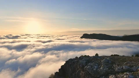 Timelapse with sunset above clouds and mountains Stock Footage 168193657