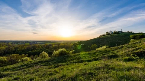 Timelapse of the sunset above meadow and agriculture land. Stock Footage 94822330