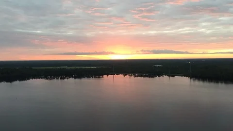 Timelapse sunset across a large lake with fast moving clouds Stock Footage 123350593