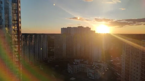 Timelapse of Sunset against the backdrop of dense urban development Stock Footage 324612611
