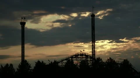 Timelapse of sunset at an amusement park - 3 shots Video stock 12345372