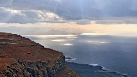Timelapse sunset and clouds on Atlantic ocean, Lanzarote, 4k footage video Stock Footage 105687829